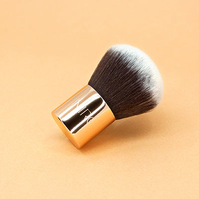 Get that glow with the 135 Face and Body Kabuki